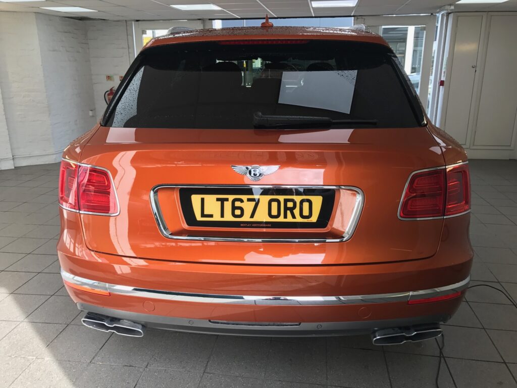 shaped number plate