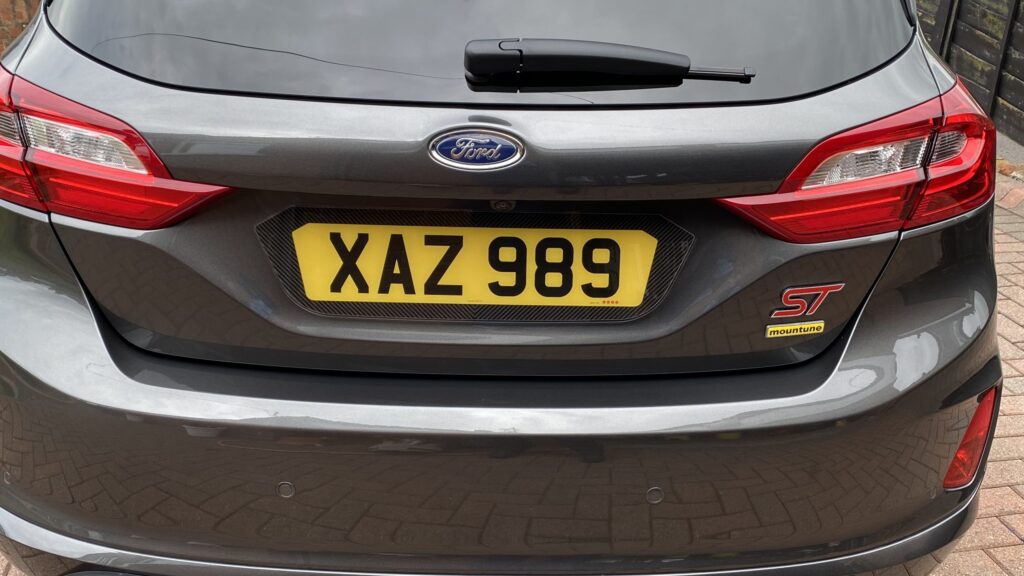 shaped number plate