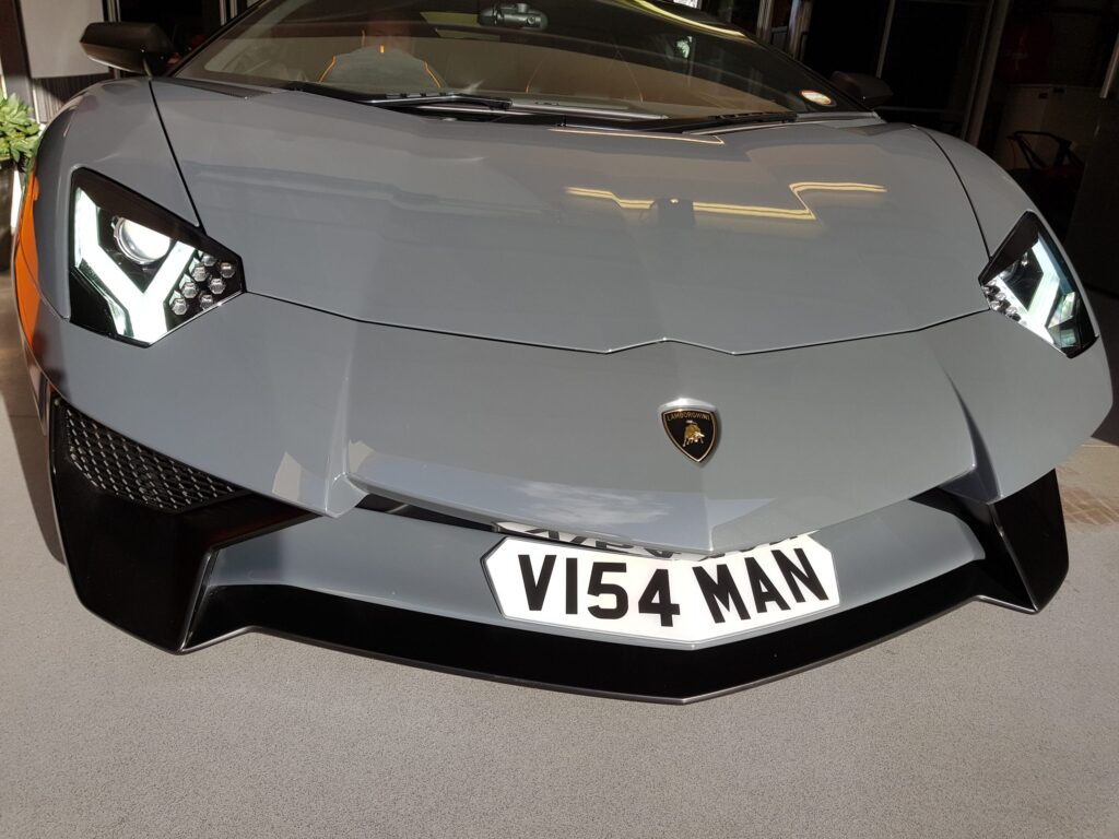 shaped number plate