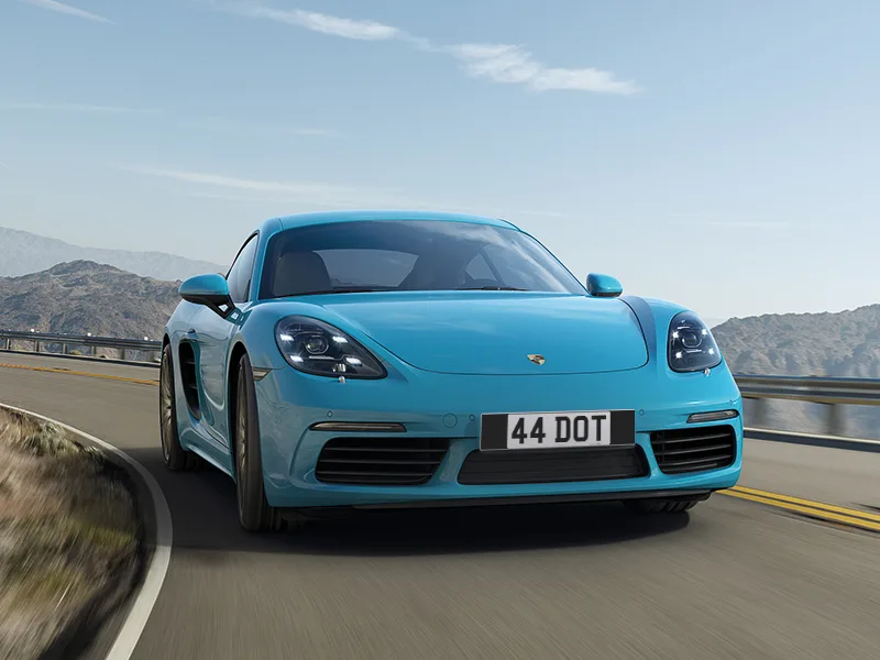 Porsche Cayman 718 Black Signature & Classic Plate Set