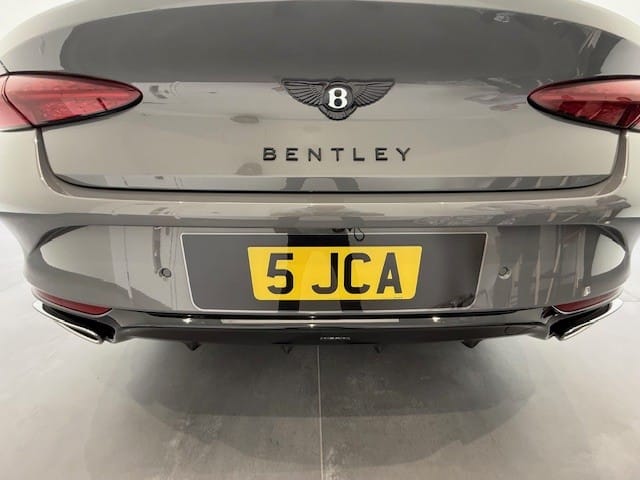 Personalised Fourdot Signature Range shaped number plate showcased on Bentley Continental GTC