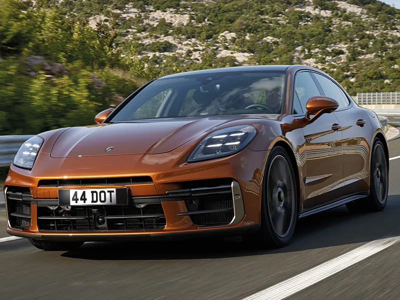 Front view of a Porsche Panamera fitted with a black Classic front number plate.